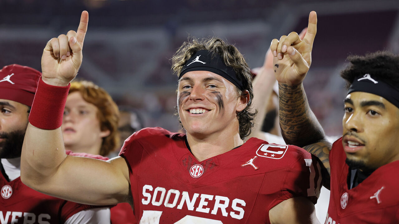 NORMAN, OKLAHOMA - SEPTEMBER 4: Quarterback John Mateer #10 and wide receiver Isaiah Sategna III #1 of the Oklahoma Sooners celebrate after a 51-0 win over the UTEP Miners at Gaylord Family Oklahoma Memorial Stadium on September 4, 2026 in Norman, Oklahoma.