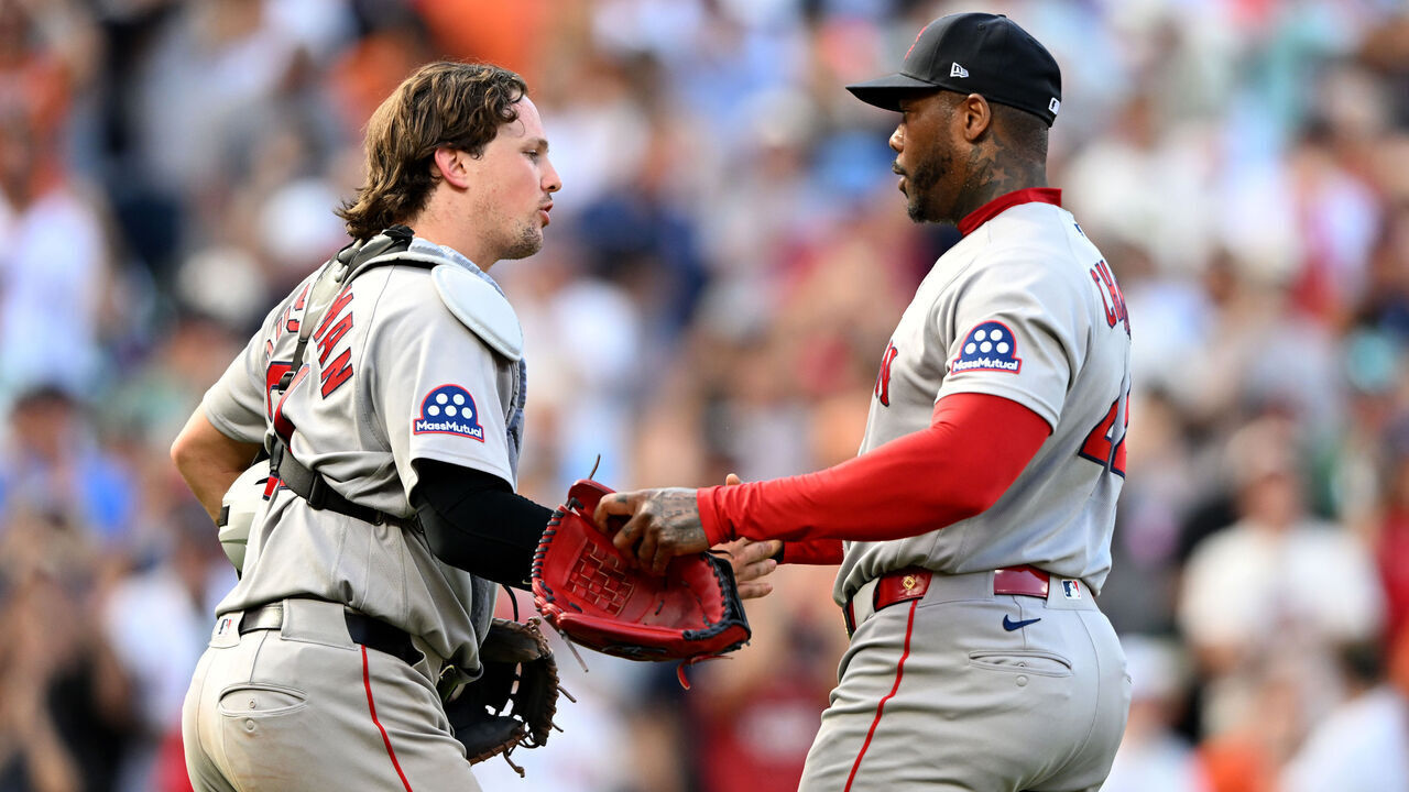 BALTIMORE, MARYLAND - SEPTEMBER 06: Adley Rutschman #31 and Aroldis Chapman #44 of the Boston Red Sox celebrate after a 3-1 victory against the Baltimore Orioles at Oriole Park at Camden Yards on September 06, 2026 in Baltimore, Maryland.