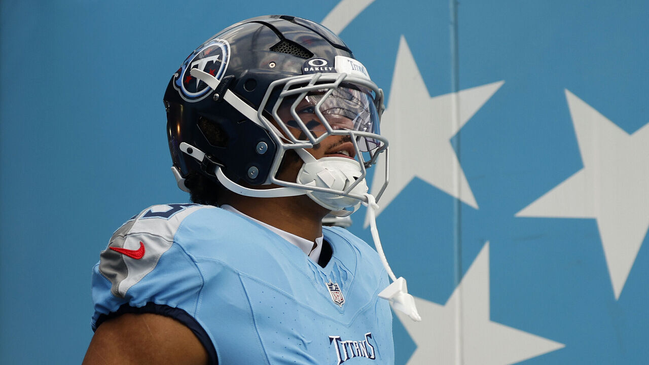 NASHVILLE, TN - DECEMBER 28: Tennessee Titans linebacker Cedric Gray (33) walks out of the tunnel for pregame warmups prior to a game between the Tennessee Titans and New Orleans Saints, December 28, 2025, at Nissan Stadium in Nashville, Tennessee.