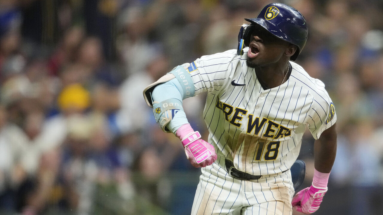 MILWAUKEE, WISCONSIN - AUGUST 29: Luis Lara #18 of the Milwaukee Brewers celebrates after hitting an RBI single against the Texas Rangers in the seventh inning at American Family Field on August 29, 2026 in Milwaukee, Wisconsin.