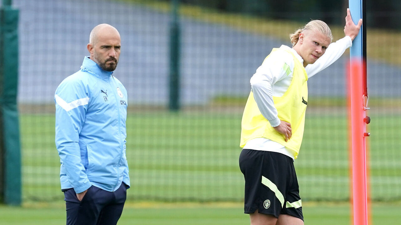 Manchester City's Erling Haaland (right) and coach Enzo Maresca during a training session at the City Football Academy, Manchester. Picture date: Tuesday June 6, 2023.