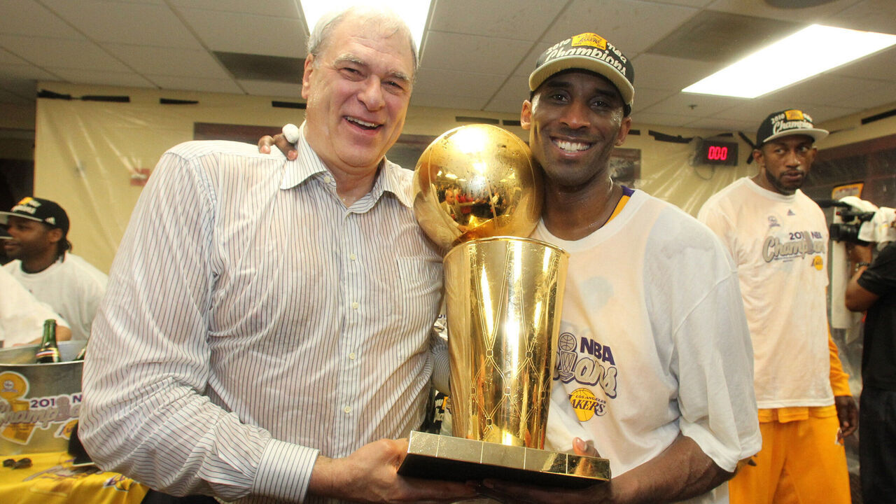 LOS ANGELES - JUNE 17: Head Coach Phil Jackson and Kobe Bryant #24 of the Los Angeles Lakers celebrates in the locker room after Game Seven of the 2010 NBA Finals on June 17, 2010 at Staples Center in Los Angeles, California. The Lakers defeated the Celtics 83-79. NOTE TO USER: User expressly acknowledges and agrees that, by downloading and/or using this Photograph, user is consenting to the terms and conditions of the Getty Images License Agreement. Mandatory Copyright Notice: Copyright 2010 NBAE