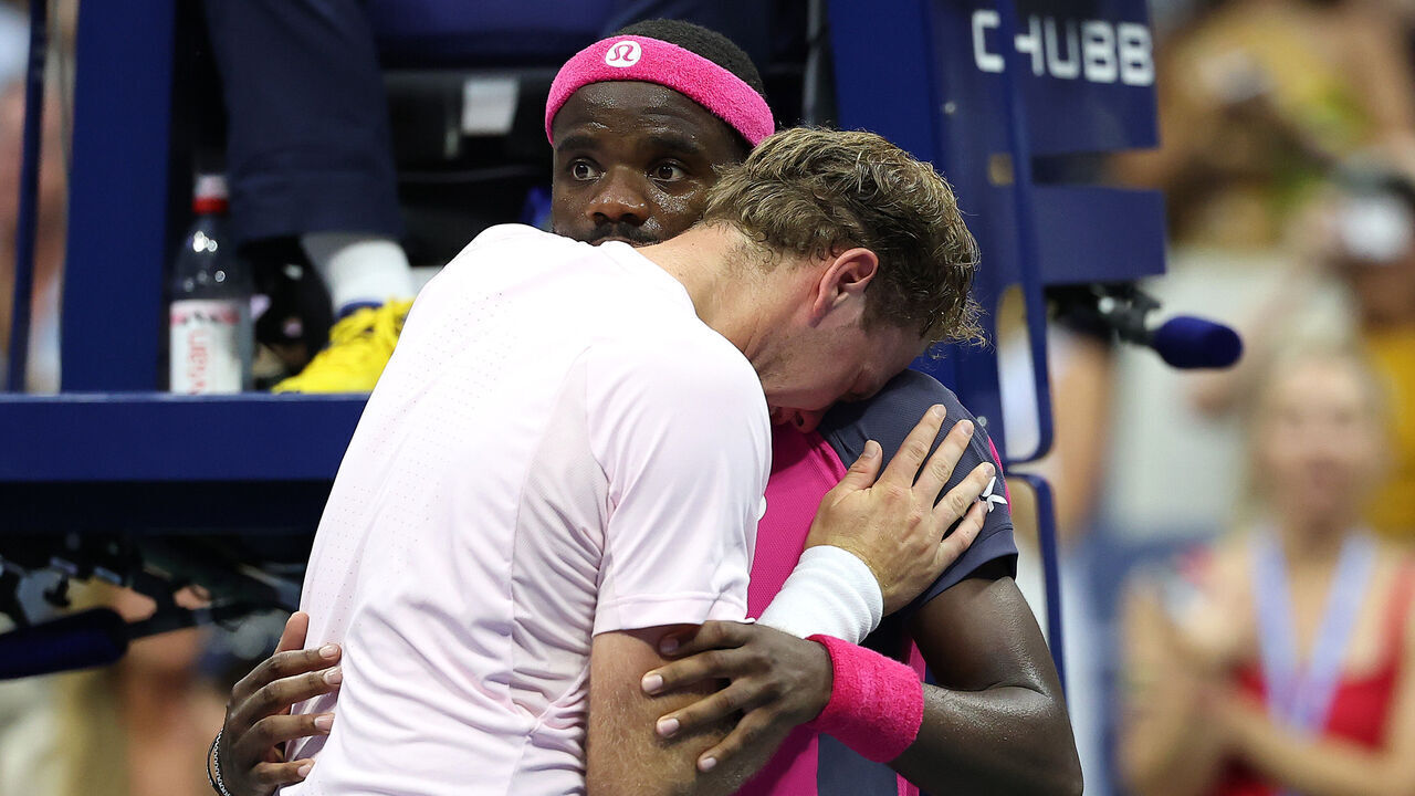 NEW YORK, NEW YORK - SEPTEMBER 08: Alex Michelsen of the United States and Frances Tiafoe of the United States embrace after their Men's Singles Quarterfinal match on Day Ten of the 2026 US Open at USTA Billie Jean King National Tennis Center on September 08, 2026 in the Flushing neighborhood of the Queens borough of New York City.