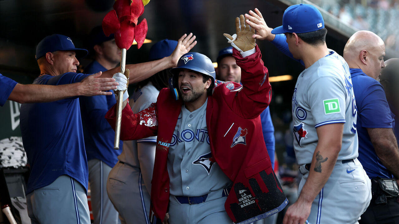 SACRAMENTO, CALIFORNIA - SEPTEMBER 08: Josh Smith #9 of the Toronto Blue Jays is congratulated by teammates after hitting a home run against the Athletics during the second inning at Sutter Health Park on September 08, 2026 in Sacramento, California.