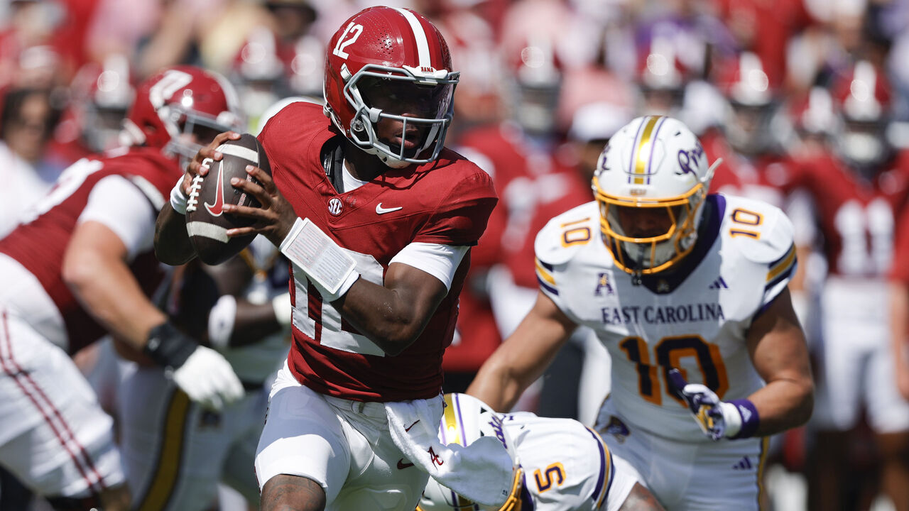 TUSCALOOSA, ALABAMA - SEPTEMBER 5: Quarterback Keelon Russell #12 of the Alabama Crimson Tide scrambles for a first down against the East Carolina Pirates during the first half of a game at Bryant Denny Stadium on September 5, 2026 in Tuscaloosa, Alabama.