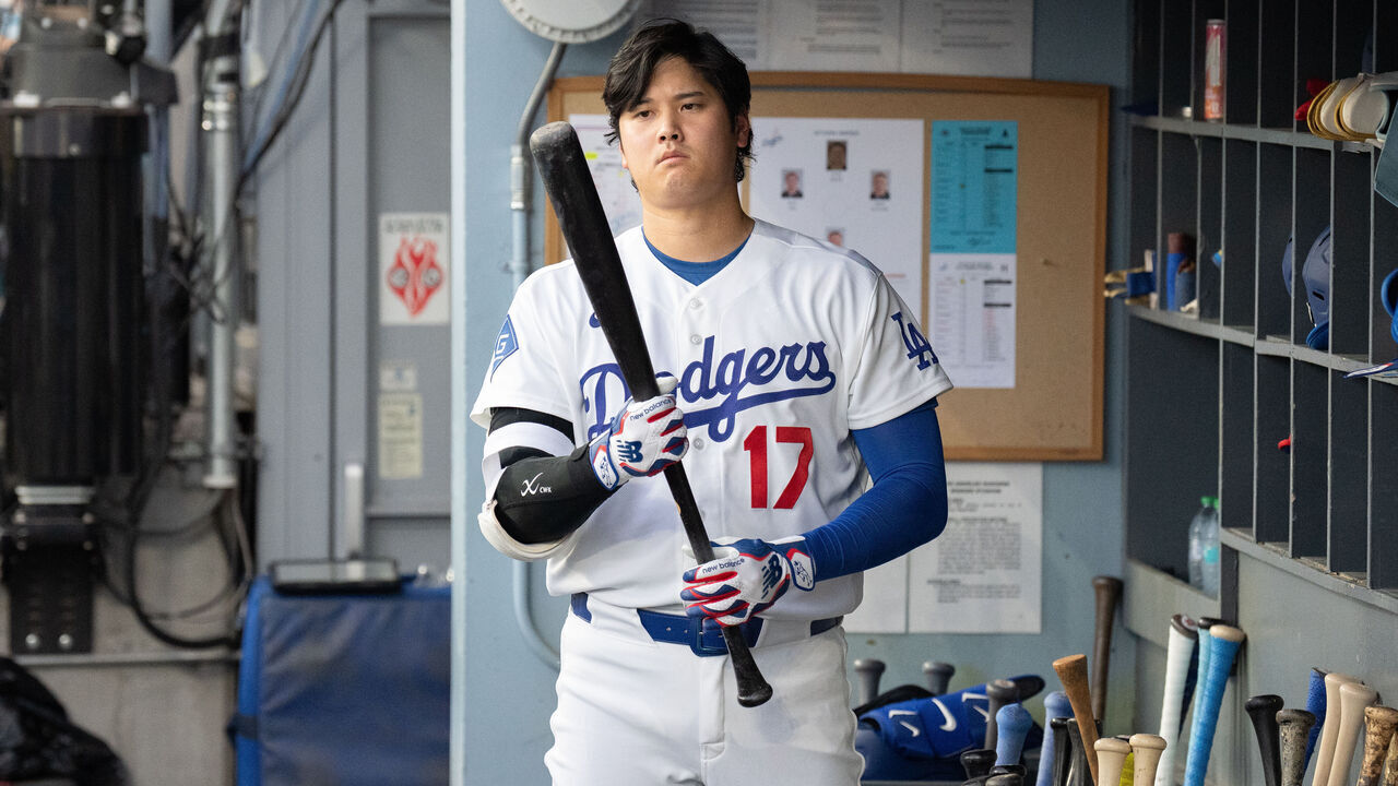 Los Angeles Dodgers designated hitter Shohei Ohtani (17) holds a bat in the dugout during a Major League Baseball game between the Cincinnati Reds and the Los Angeles Dodgers at Dodger Stadium in Los Angeles, California, on September 7, 2026.