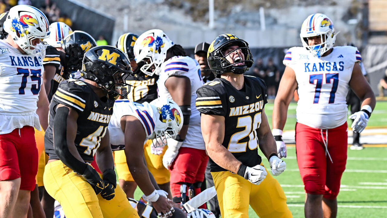 COLUMBIA, MO - SEPTEMBER 06: Missouri Tigers linebacker Josiah Trotter (40) and Missouri Tigers linebacker Nicholas Rodriguez (20) celebrate getting a tackle for a loss of yards during a non conference game between the Kansas Jayhawks and the Missouri Tigers held on Saturday September 06, 2025 at Faurot Field at Memorial Stadium in Columbia MO. (Photo by Rick Ulreich/Icon Sportswire via Getty Images