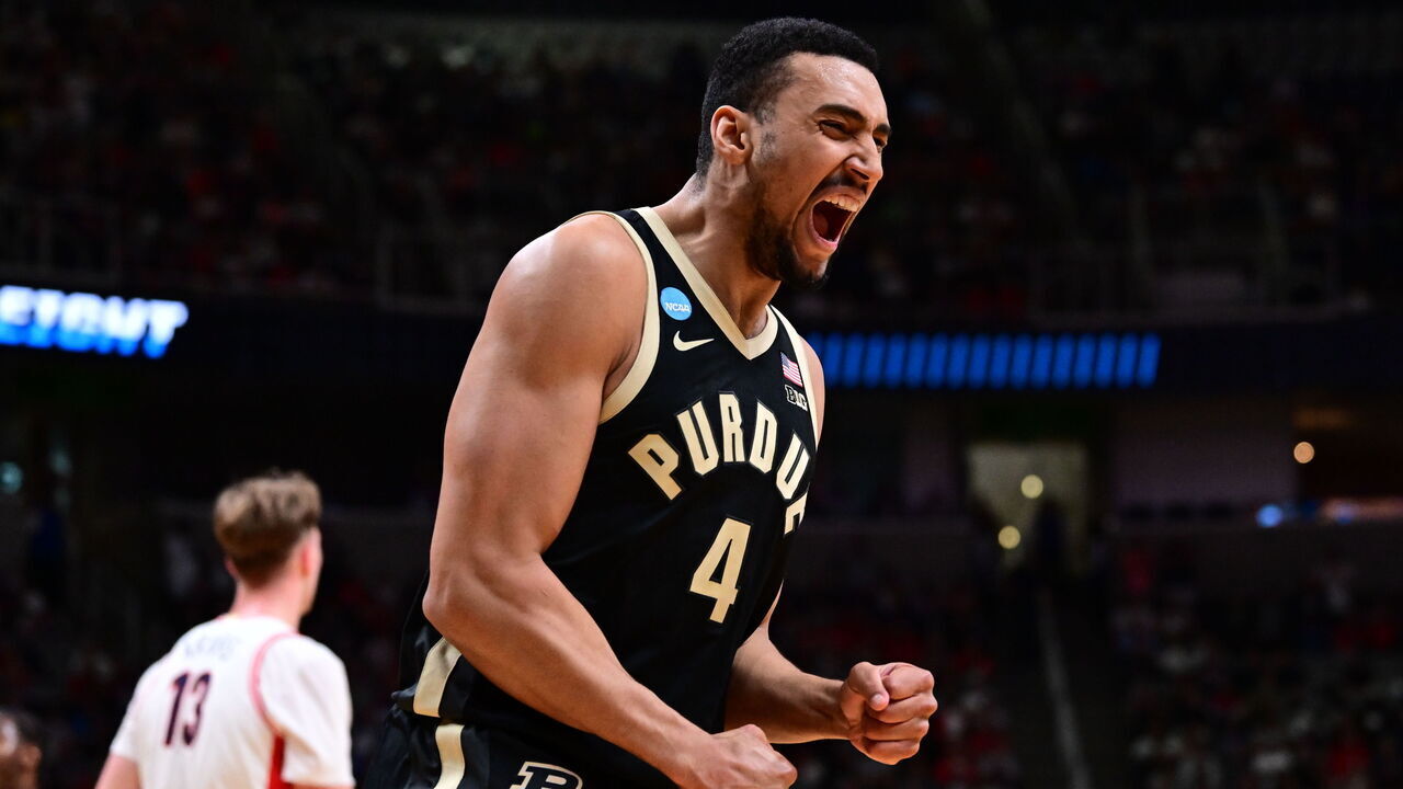 SAN JOSE, CALIFORNIA - MARCH 28: Trey Kaufman-Renn #4 of the Purdue Boilermakers celebrates against the Arizona Wildcats during the Elite Eight round game of the 2026 NCAA Men's Basketball Tournament held at SAP Center on March 28, 2026 in San Jose, California.