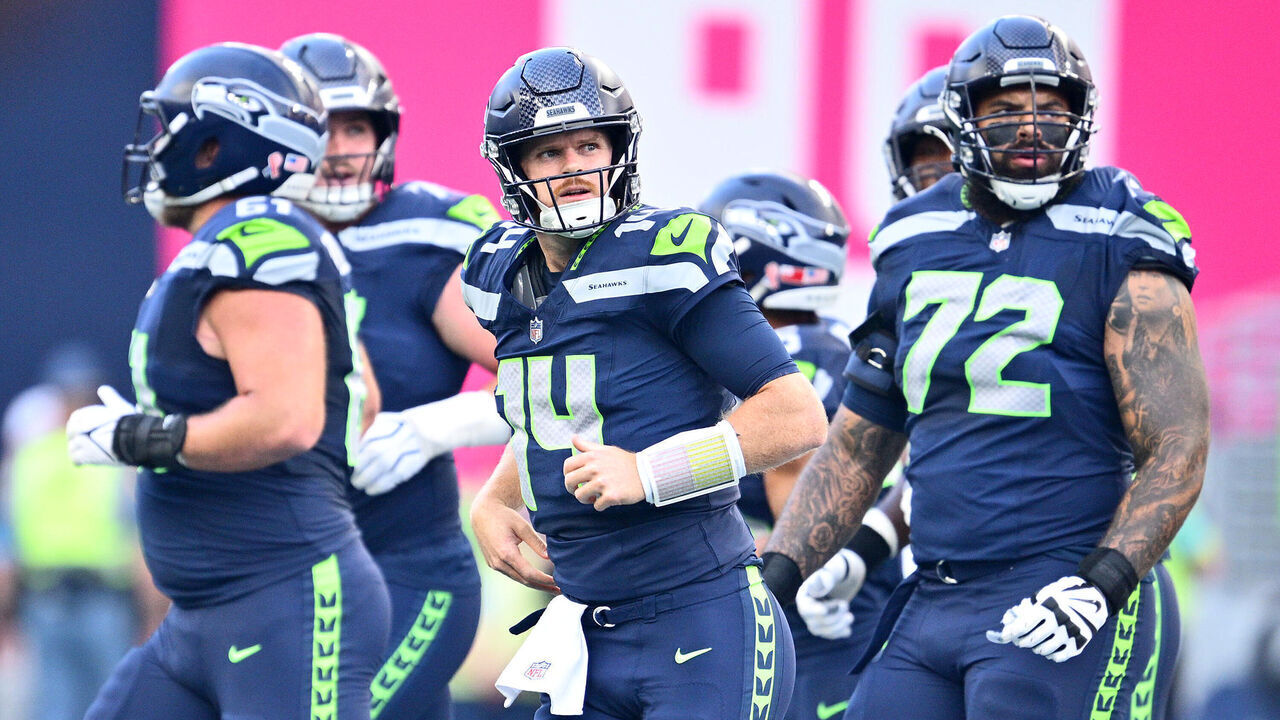SEATTLE, WASHINGTON - SEPTEMBER 09: Sam Darnold #14 of the Seattle Seahawks looks on after a play against the New England Patriots during the first quarter in the game at Lumen Field on September 09, 2026 in Seattle, Washington.