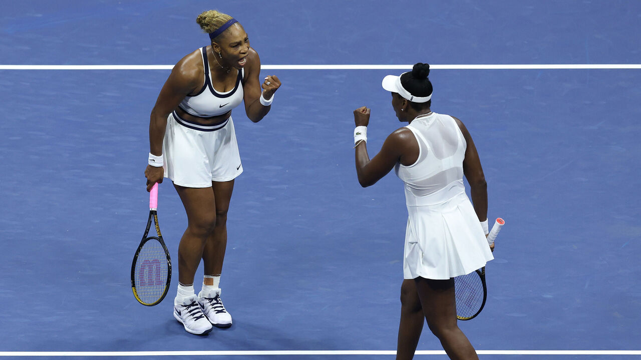 NEW YORK, NEW YORK - SEPTEMBER 04: Serena Williams of the United States celebrates with Venus Williams before their Women's Doubles match against Hao-Ching Chan of Taiwan and Maya Joint of Australia on Day Six of the 2026 US Open at USTA Billie Jean King National Tennis Center on September 04, 2026 in the Flushing neighborhood of the Queens borough of New York City.