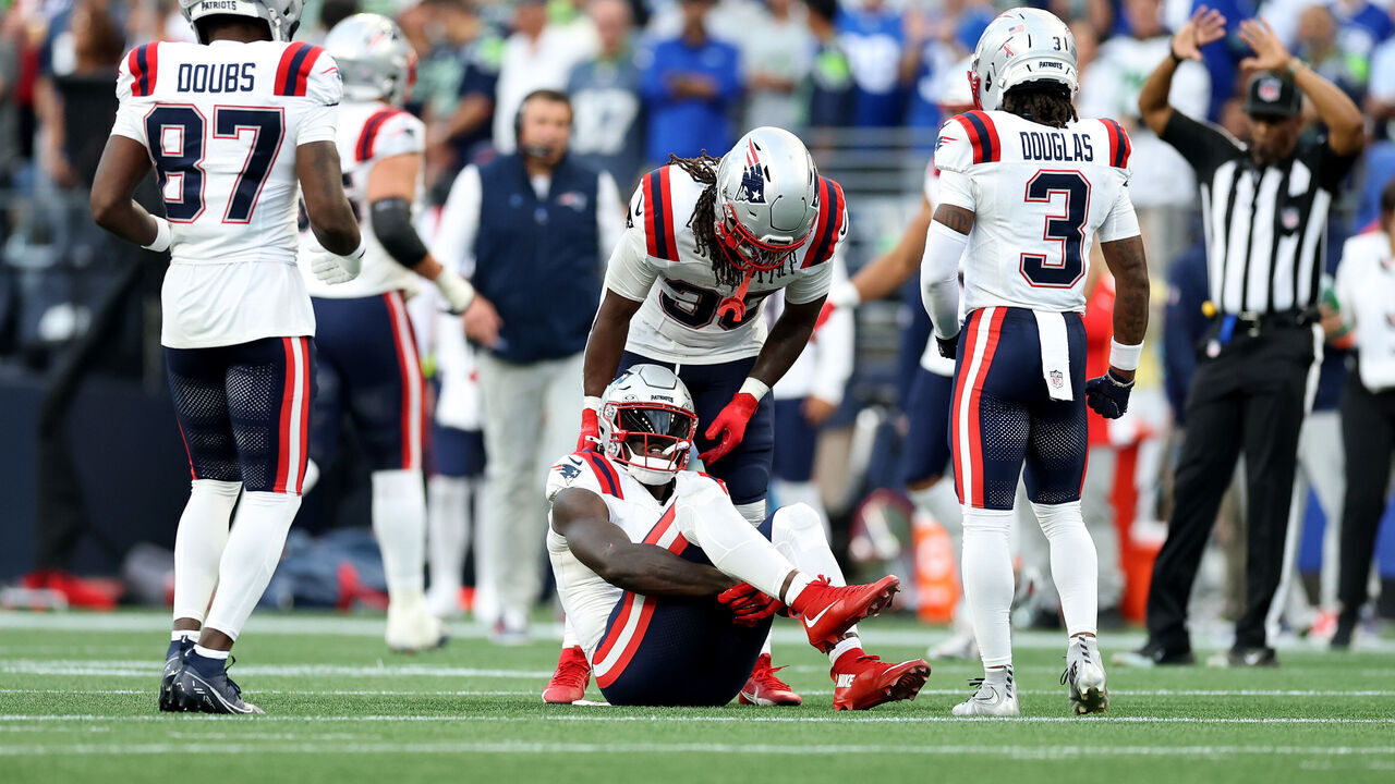 SEATTLE, WASHINGTON - SEPTEMBER 09: A.J. Brown #1 of the New England Patriots reacts after being injured in a play against the Seattle Seahawks during the third quarter in the game at Lumen Field on September 09, 2026 in Seattle, Washington.