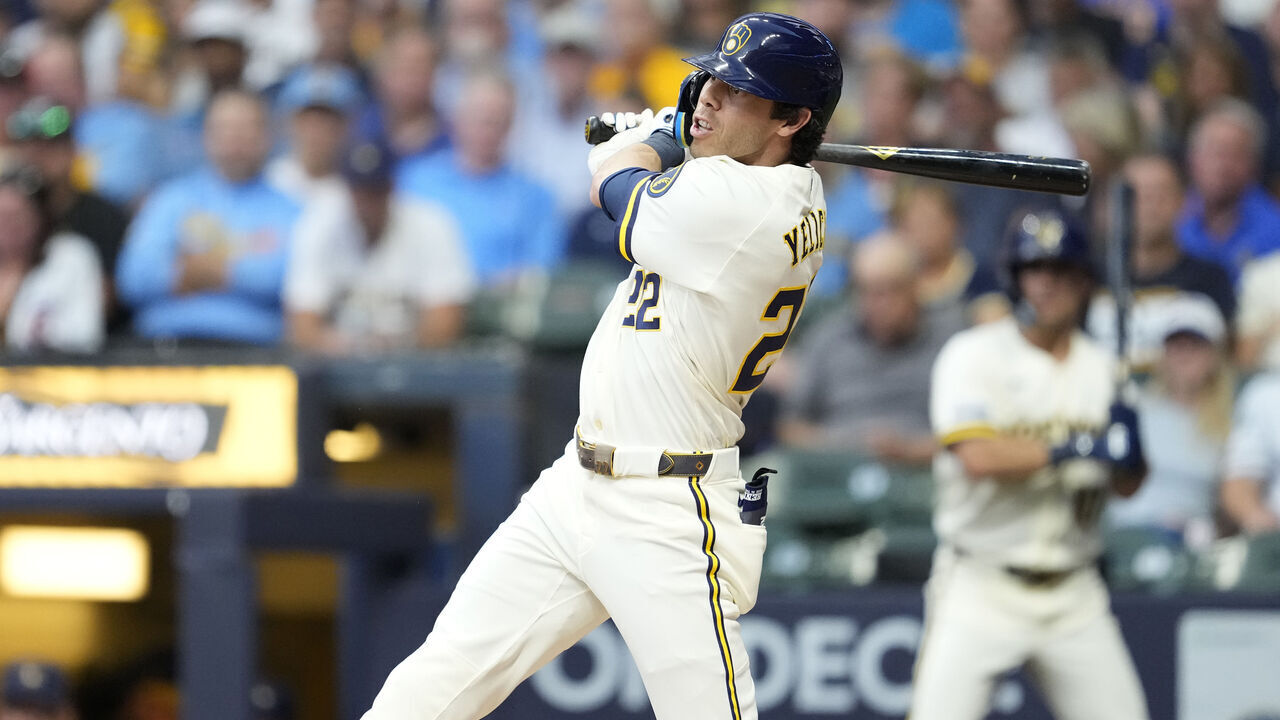 MILWAUKEE, WISCONSIN - SEPTEMBER 09: Christian Yelich #22 of the Milwaukee Brewers hits a three-run home run against the Chicago Cubs in the first inning at American Family Field on September 09, 2026 in Milwaukee, Wisconsin.