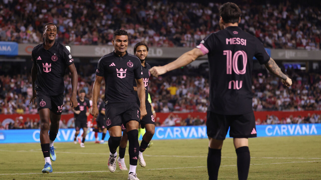 CHICAGO, ILLINOIS - SEPTEMBER 09: Casemiro #5 of Inter Miami celebrates scoring his team's first goal with teammate Lionel Messi #10 during the MLS match between Chicago Fire FC and Inter Miami CF at Soldier Field on September 09, 2026 in Chicago, Illinois.
