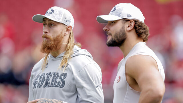 George Kittle (85) chats with Nick Bosa (97) during warmups before the San Francisco 49ers played the Seattle Seahawks at Levi's Stadium in Santa Clara, Calif., on Sunday, November 17, 2024.