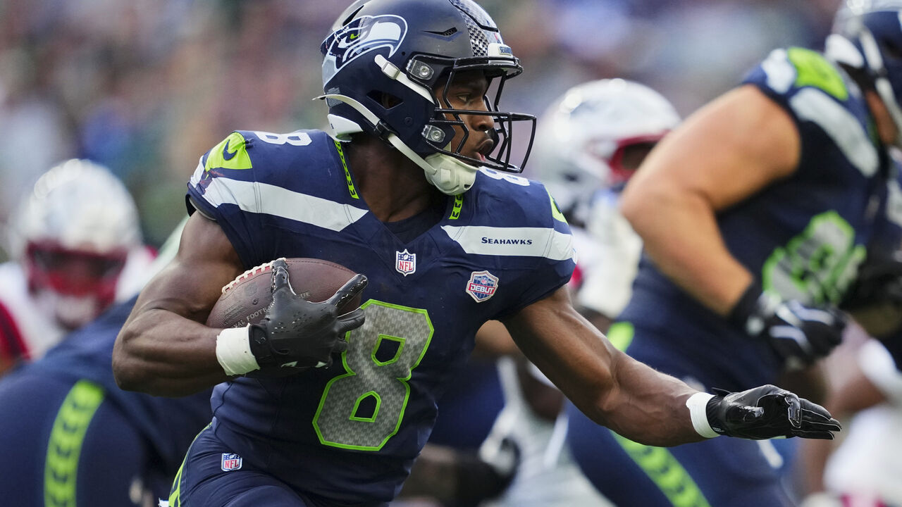 SEATTLE, WASHINGTON - SEPTEMBER 09: Jadarian Price #8 of the Seattle Seahawks carries the ball against the New England Patriots during an NFL football game at Lumen Field on September 9, 2026 in Seattle, Washington.
