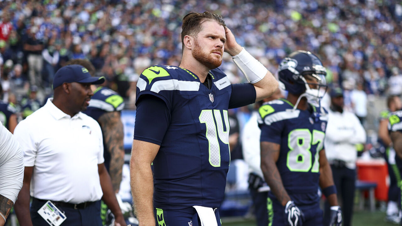 SEATTLE, WASHINGTON - SEPTEMBER 9: Sam Darnold #14 of the Seattle Seahawks stands on the sidelines prior to an NFL football game against the New England Patriots at Lumen Field on September 9, 2026 in Seattle, Washington.