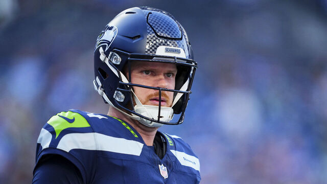 SEATTLE, WASHINGTON - SEPTEMBER 09: Sam Darnold #14 of the Seattle Seahawks warms up before kickoff against the New England Patriots during an NFL football game at Lumen Field on September 9, 2026 in Seattle, Washington.