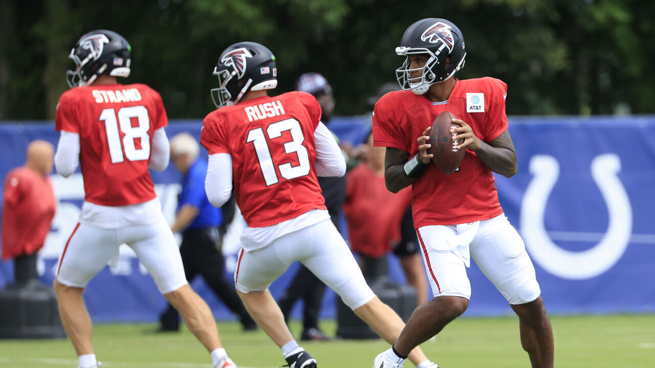 WESTFIELD, INDIANA - AUGUST 19: (R-L) Tua Tagovailoa #1, Cooper Rush #13 and Jack Strand #18 of the Atlanta Falcons step back to pass during the joint practice with the Indianapolis Colts at Grand Park Sports Campus on August 19, 2026 in Westfield, Indiana.