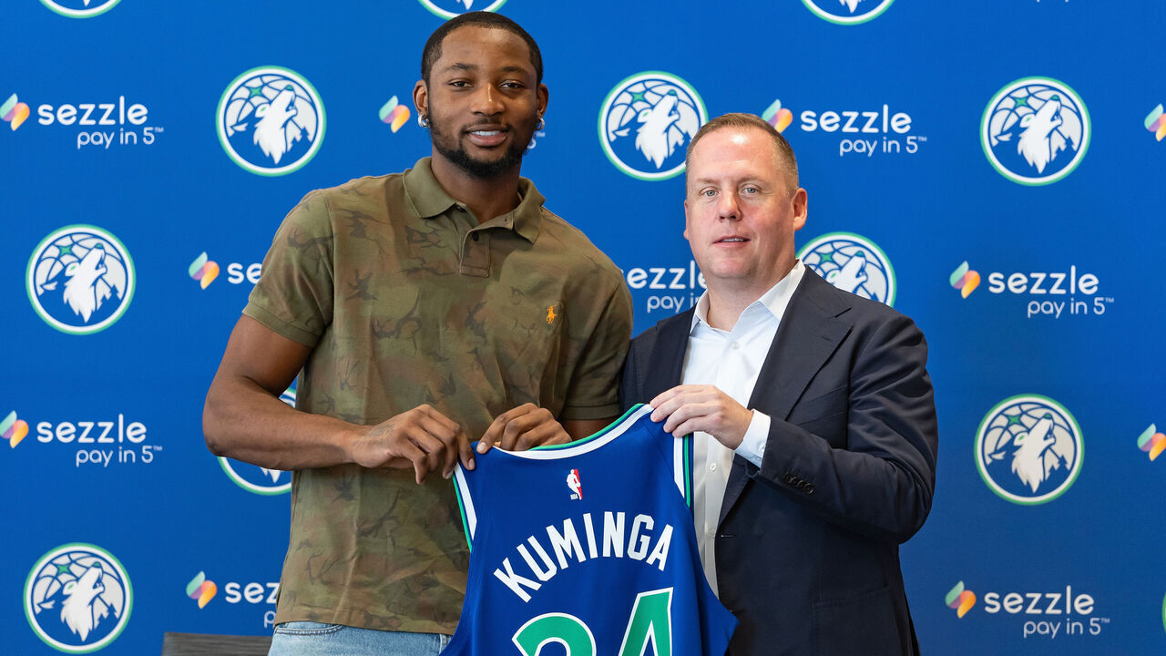 MINNEAPOLIS, MN - SEPTEMBER 10: Jonathan Kuminga #24 of the Minnesota Timberwolves is introduced to the media by President of Basketball Operations Tim Connelly and radio play-by-play announcer Alan Horton on September 10, 2026 at Target Center in Minneapolis, Minnesota. Mandatory Copyright Notice: Copyright 2026 NBAE