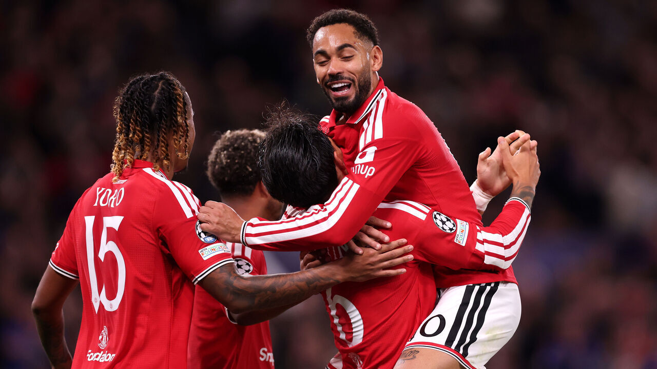 MANCHESTER, ENGLAND - SEPTEMBER 10: Lisandro Martinez of Manchester United is congratulated by team mate Matheus Cunha after scoring his team’s fourth goal during the UEFA Champions League 2026/27 League Phase MD1 match between Manchester United and Sabah FC at Old Trafford on September 10, 2026 in Manchester, England.