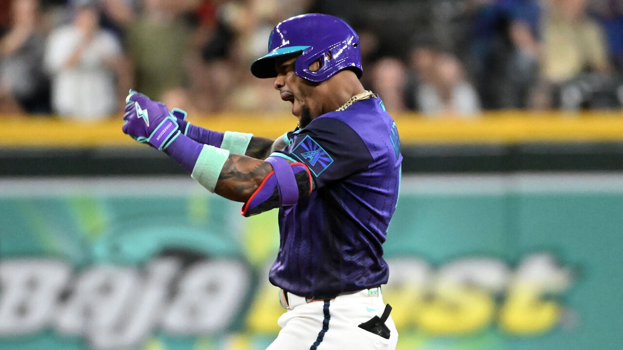 PHOENIX, ARIZONA - SEPTEMBER 11: Ketel Marte #4 of the Arizona Diamondbacks celebrates after hitting a two-RBI double against the Texas Rangers during the fifth inning at Chase Field on September 11, 2026 in Phoenix, Arizona.