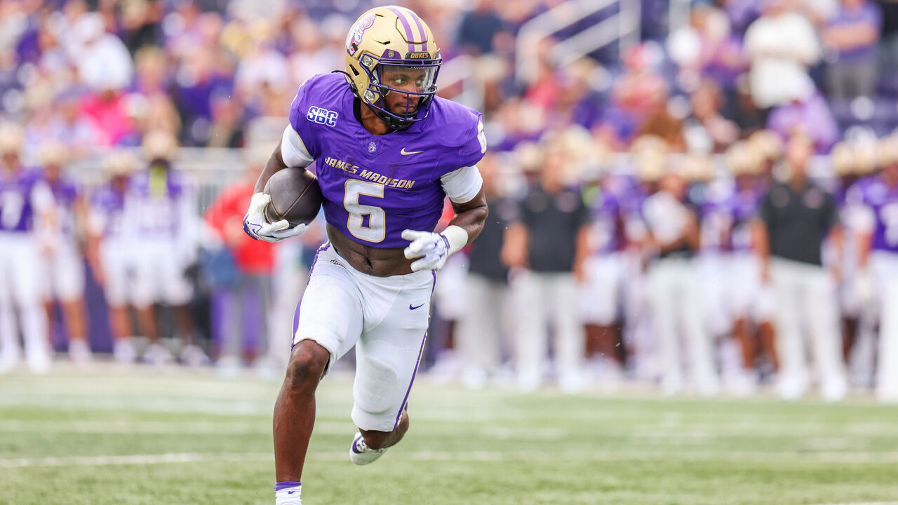 HARRISONBURG, VIRGINIA - SEPTEMBER 05: George Pettaway #6 of the James Madison Dukes rushes for a touchdown during a game between the James Madison Dukes and the Liberty Flames at Bridgeforth Stadium on September 5, 2026 in Harrisonburg, Virginia.