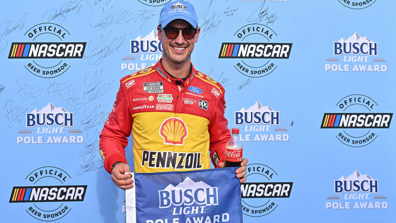MADISON, ILLINOIS - SEPTEMBER 12: Joey Logano, driver of the #22 Shell Pennzoil Ford, poses for photos after winning the pole award during qualifying for the NASCAR Cup Series Cook Out Southern 500 at WWT Raceway on September 12, 2026 in Madison, Illinois.