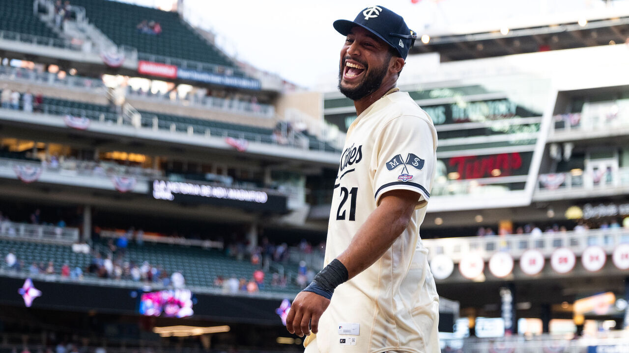 MINNEAPOLIS, MINNESOTA - SEPTEMBER 12: Emmanuel Rodriguez #21 of the Minnesota Twins laughs after receiveing an ice bath from his teammates after his MLB debut game against the Cleveland Guardians at Target Field on September 12, 2026 in Minneapolis, Minnesota. Rodriguez hit a solo home run in his first career at-bat.