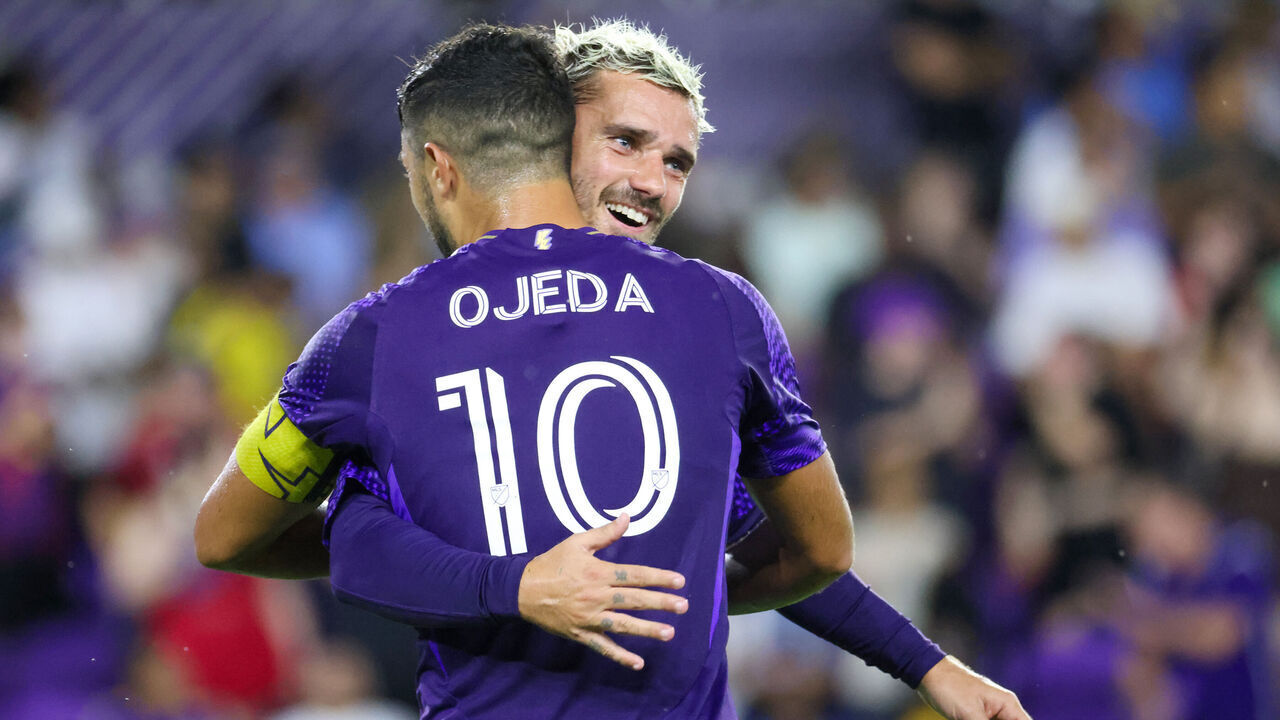 ORLANDO, FLORIDA - SEPTEMBER 12: Martín Ojeda #10 of the Orlando City SC hugs Antoine Griezmann #7 of the Orlando City SC after he scores a goal during the first half against Toronto FC at Inter.co Stadium on September 12, 2026 in Orlando, Florida.