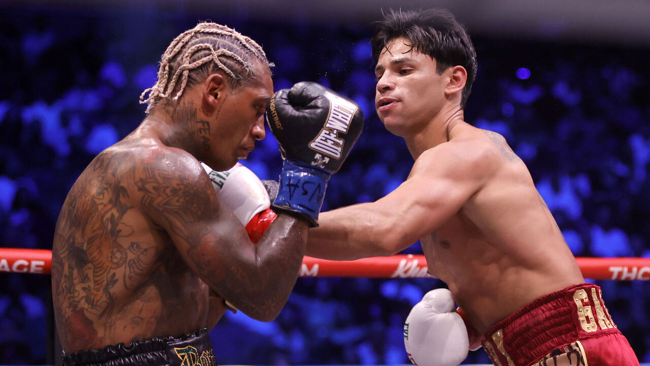 LAS VEGAS, NEVADA - SEPTEMBER 12: WBC welterweight champion Ryan Garcia (R) punches Conor Benn in the second round of a title fight at T-Mobile Arena on September 12, 2026 in Las Vegas, Nevada. Garcia retained his title with a second-round TKO.