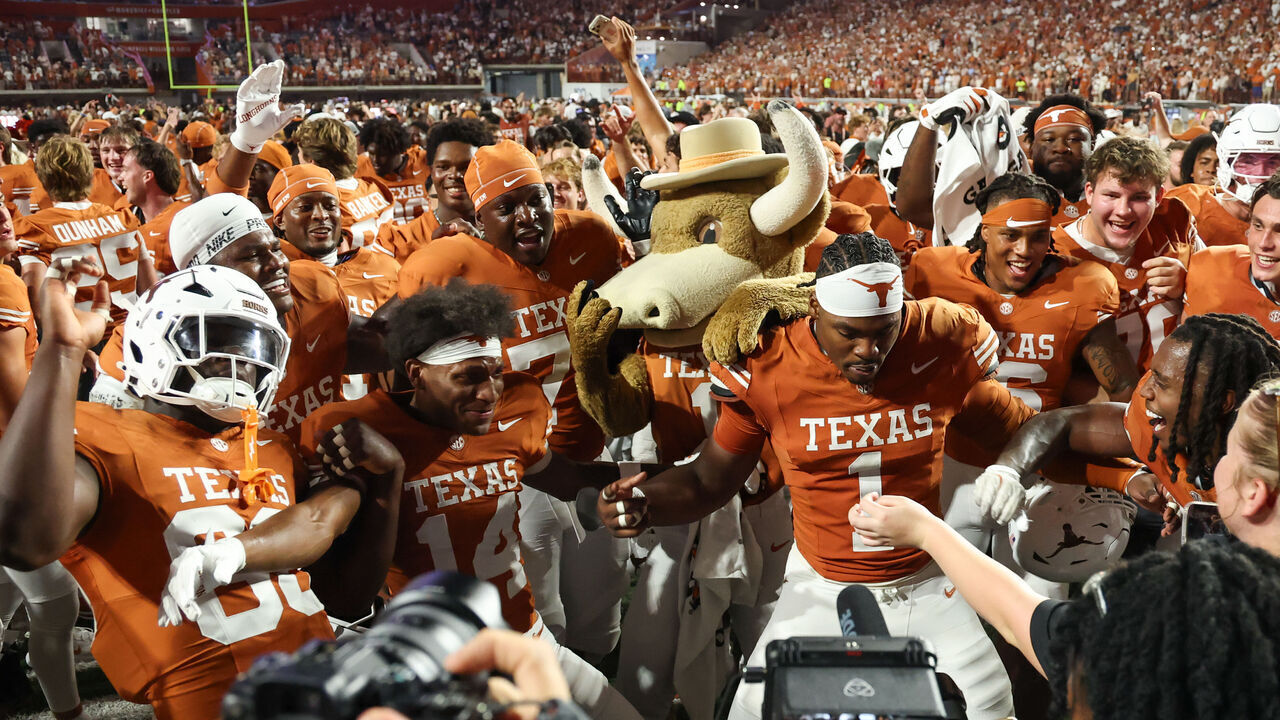 AUSTIN, TX - SEPTEMBER 12: Defensive end Colin Simmons #1 of the Texas Longhorns celebrates with teammates after winning the college football game the Texas Longhorns and the Ohio State Buckeyes on September 12, 2026, at Darrell K Royal-Texas Memorial Stadium in Austin, TX.
