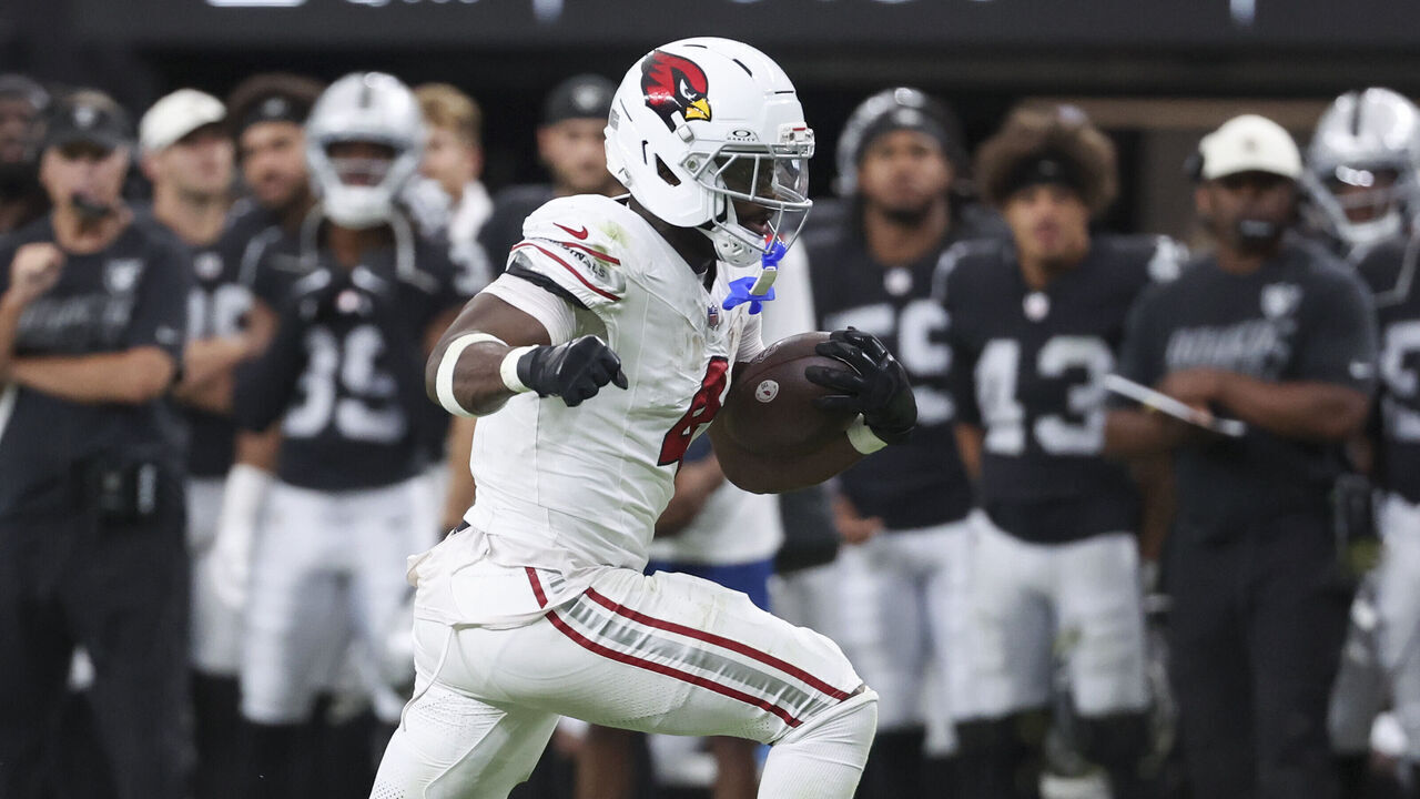 LAS VEGAS, NEVADA - AUGUST 13: Jeremiyah Love #4 of the Arizona Cardinals runs the ball against the Las Vegas Raiders in the second quarter of the preseason game at Allegiant Stadium on August 13, 2026 in Las Vegas, Nevada.