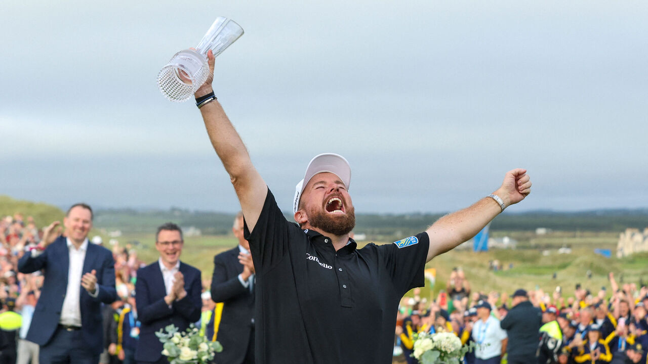 Ireland's Shane Lowry celebrates at the trophy presentation following his victory on the final day of the Irish Open golf tournament at the Trump International Golf Links & Hotel, a resort and golf course owned by US President Donald Trump, in Doonbeg, western Ireland on September 13, 2026.