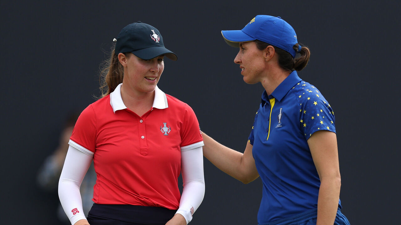CROMVOIRT, NETHERLANDS - SEPTEMBER 13: Carlota Ciganda of Team Europe hugs Jennifer Kupcho of Team United States after winning her match on the 16th green during the Sunday singles matches of the Solheim Cup 2026 at Bernardus Golf on September 13, 2026 in Cromvoirt, Netherlands.
