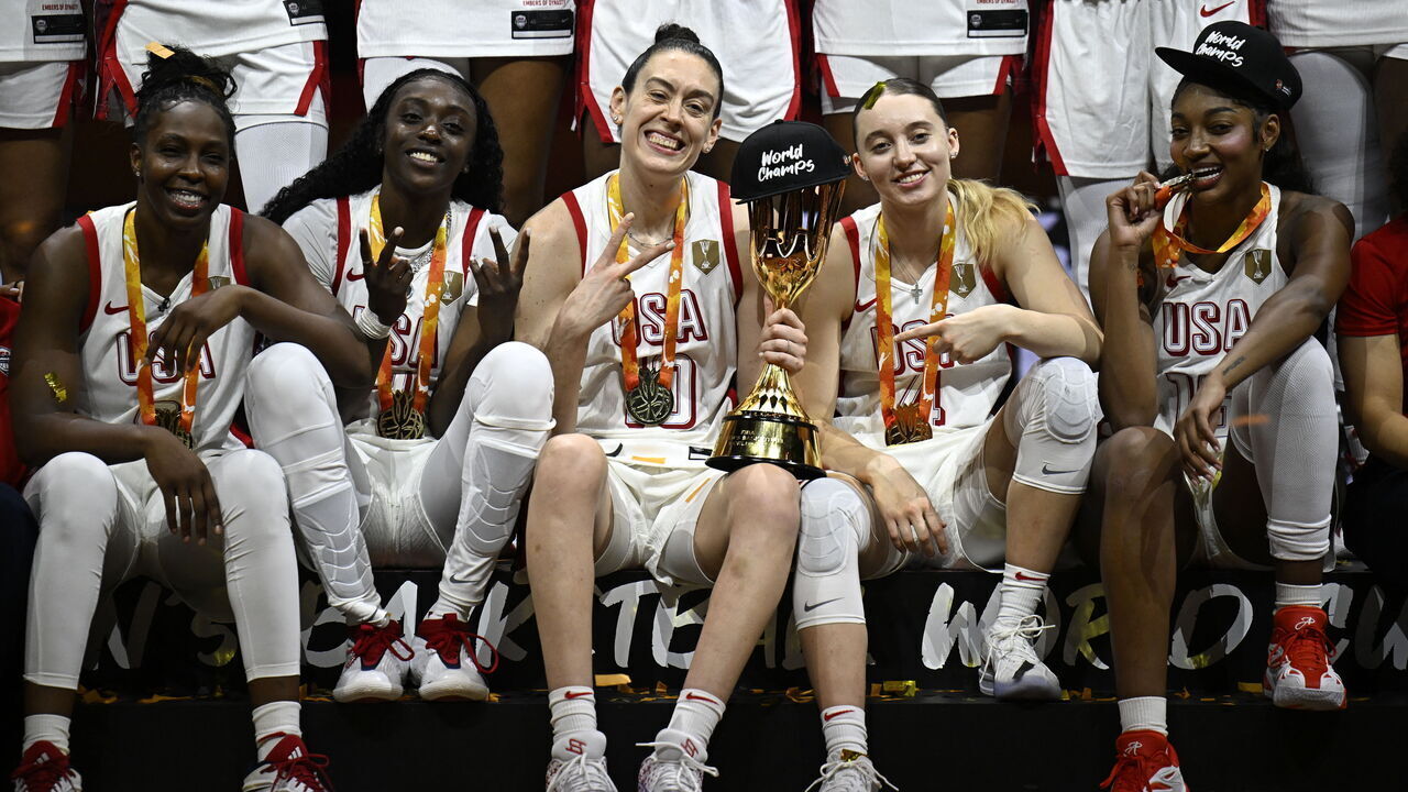 USA's team celebrates with the trophy after the 2026 FIBA Women's Basketball World Cup final game between the United States and France in Berlin on September 13, 2026.