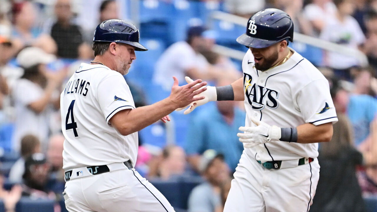 ST PETERSBURG, FLORIDA - SEPTEMBER 13: Jonathan Aranda #8 of the Tampa Bay Rays celebrates with third base coach Brady Williams #4 after hitting a home run in the fourth inning against the Houston Astros at Tropicana Field on September 13, 2026 in St Petersburg, Florida.