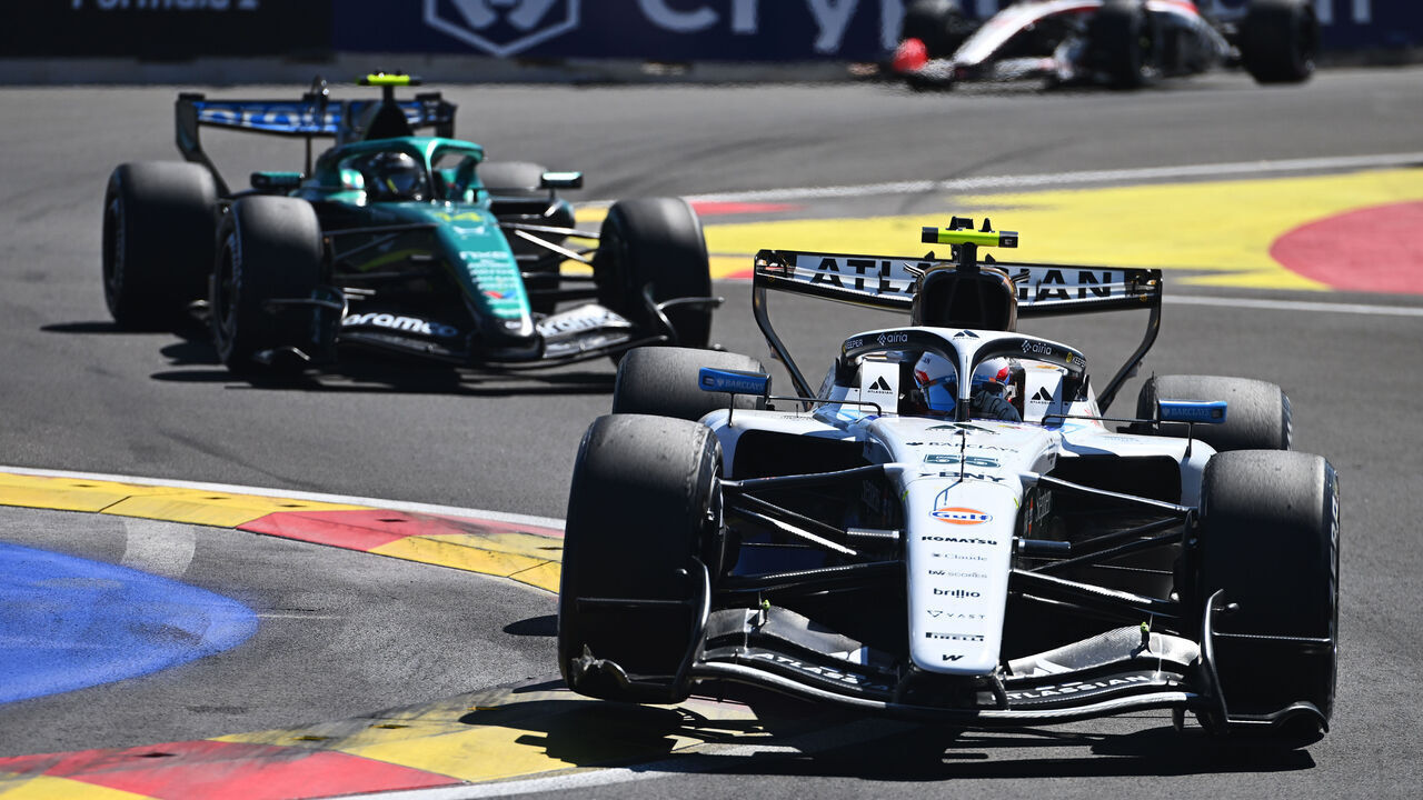 MADRID, SPAIN - SEPTEMBER 13: Carlos Sainz of Spain driving the (55) Williams FW48 Mercedes leads Fernando Alonso of Spain driving the (14) Aston Martin F1 Team AMR26 Honda on track during the F1 Grand Prix of Spain at Madring on September 13, 2026 in Madrid, Spain.