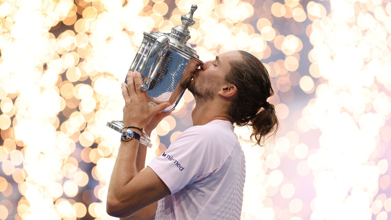 NEW YORK, NEW YORK - SEPTEMBER 13: Alexander Zverev of Germany celebrates with the trophy after defeating Ben Shelton of the United States in their Men's Singles Final match on Day Fifteen of the 2026 US Open at USTA Billie Jean King National Tennis Center on September 13, 2026 in the Flushing neighborhood of the Queens borough of New York City.