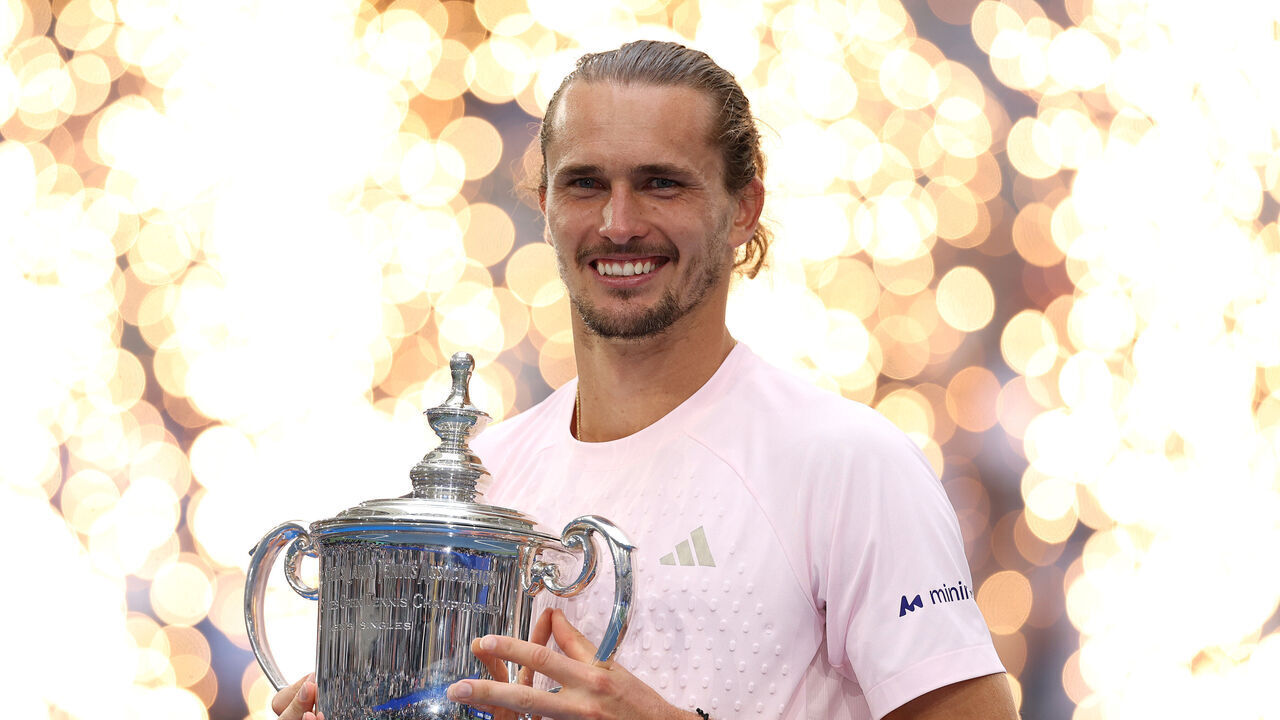 NEW YORK, NEW YORK - SEPTEMBER 13: Alexander Zverev of Germany celebrates with the trophy after defeating Ben Shelton of the United States in their Men's Singles Final match on Day Fifteen of the 2026 US Open at USTA Billie Jean King National Tennis Center on September 13, 2026 in the Flushing neighborhood of the Queens borough of New York City.