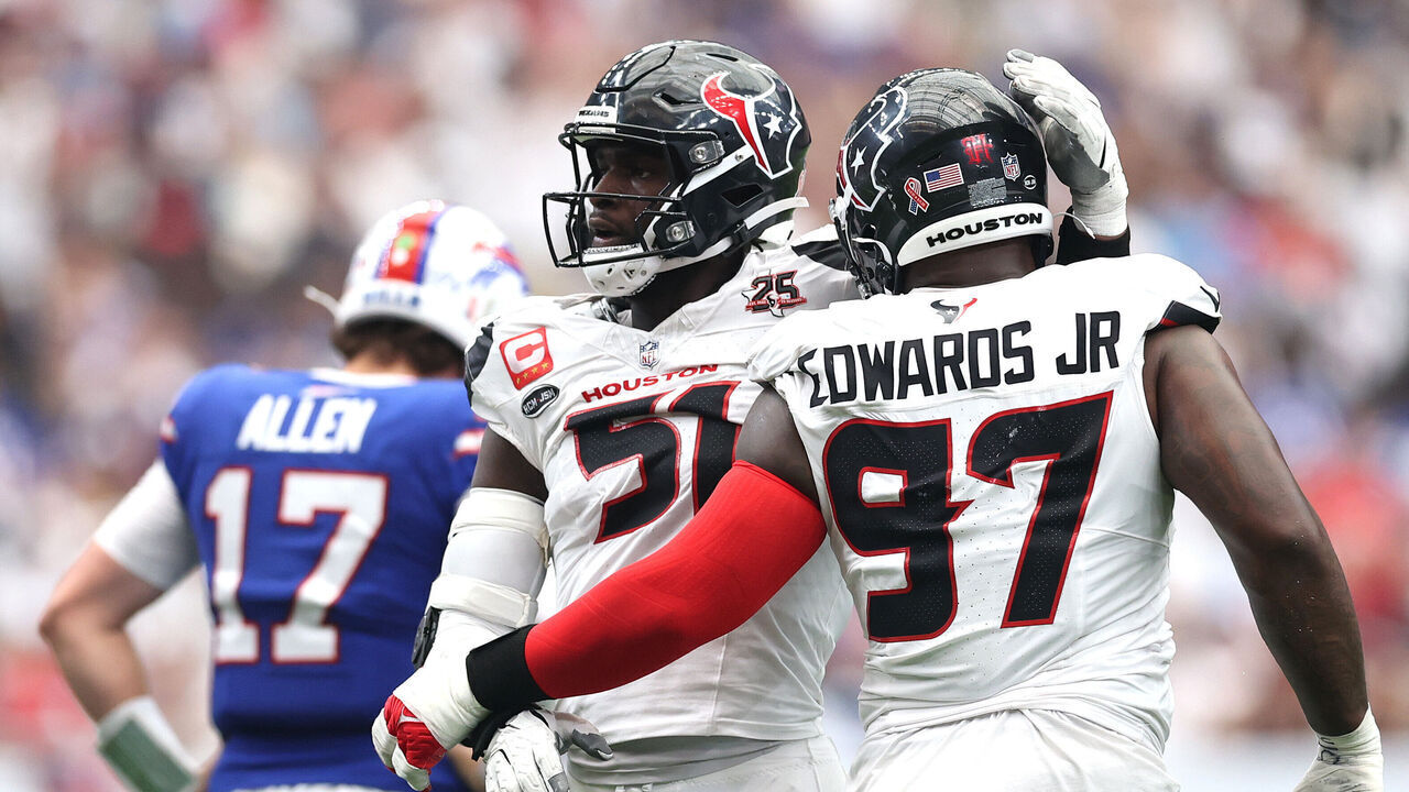 HOUSTON, TEXAS - SEPTEMBER 13: Will Anderson Jr. #51 and Mario Edwards Jr. #97 of the Houston Texans celebrate after Anderson Jr.'s tackle against the Buffalo Bills in the third quarter of a game at NRG Stadium on September 13, 2026 in Houston, Texas.
