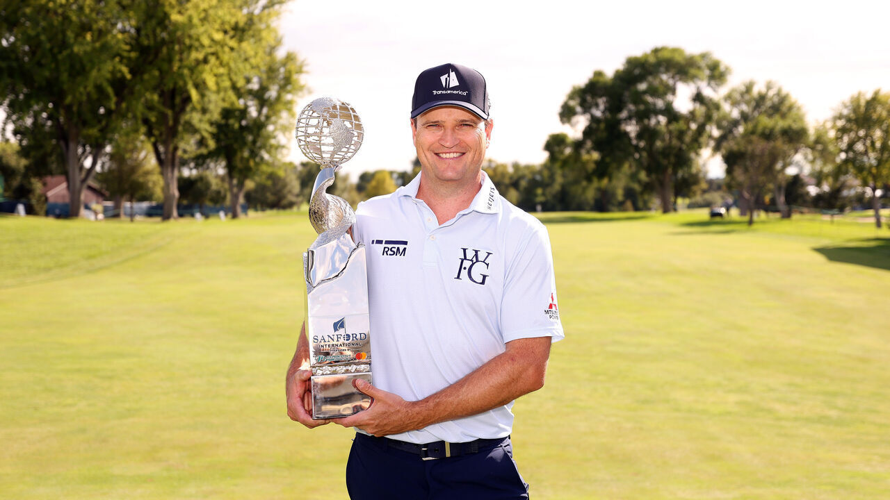 SIOUX FALLS, SOUTH DAKOTA - SEPTEMBER 13: Zach Johnson of the United States poses with the trophy after the final round of the Sanford International at Minnehaha Country Club on September 13, 2026 in Sioux Falls, South Dakota.