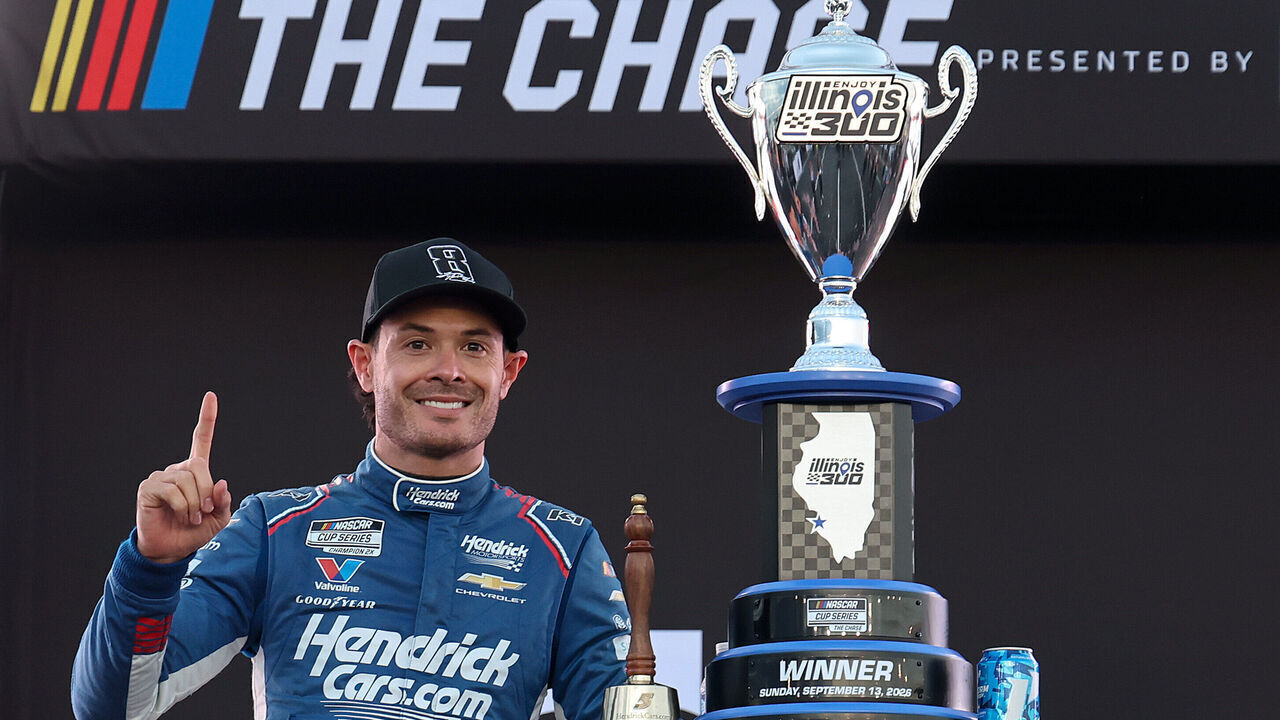 MADISON, ILLINOIS - SEPTEMBER 13: Kyle Larson, driver of the #5 HendrickCars.com Chevrolet, wears a "8" hat, a tribute to the late Kyle Busch in victory lane after winning the NASCAR Cup Series Enjoy Illinois 300 at WWT Raceway on September 13, 2026 in Madison, Illinois.
