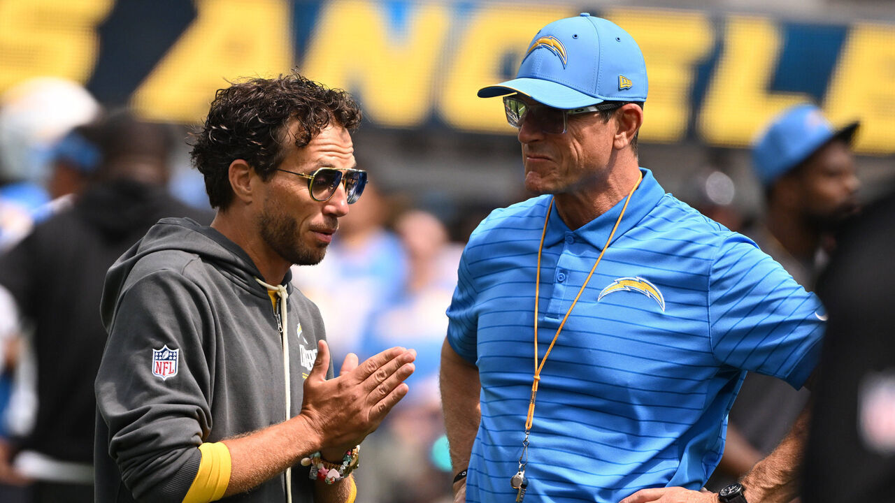 Inglewood, - September 13: Los Angeles Chargers offensive coordinator Mike McDaniel, left, with head coach Jim Harbaugh of the Los Angeles Chargers prior to a NFL football game between the Los Angeles Chargers and the Arizona Cardinals at SoFi Stadium in Inglewood on Sunday, September 13, 2026.