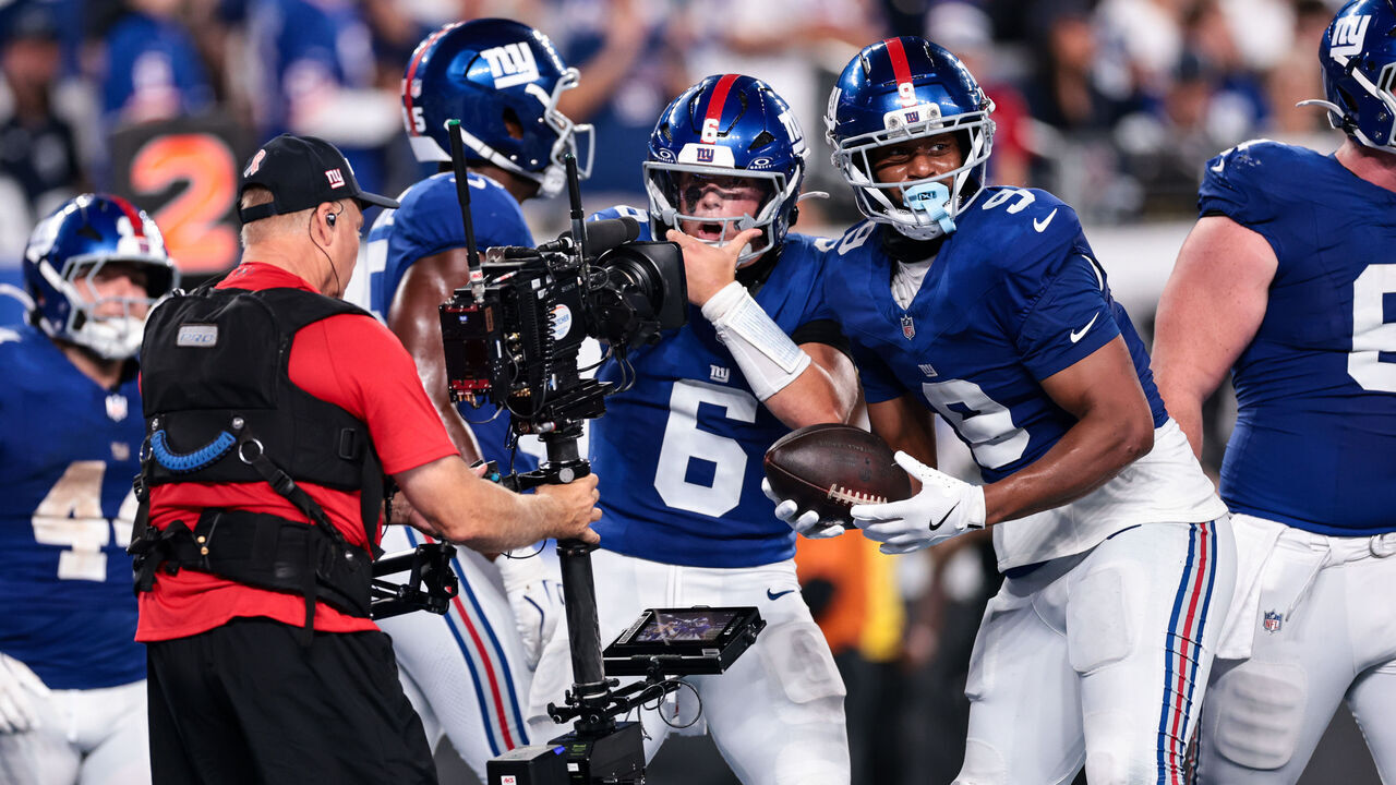 EAST RUTHERFORD, NEW JERSEY - SEPTEMBER 13: Jaxson Dart #6 and Isaiah Likely #9 of the New York Giants celebrate after a touchdown during the third quarter against the Dallas Cowboys at MetLife Stadium on September 13, 2026 in East Rutherford, New Jersey.