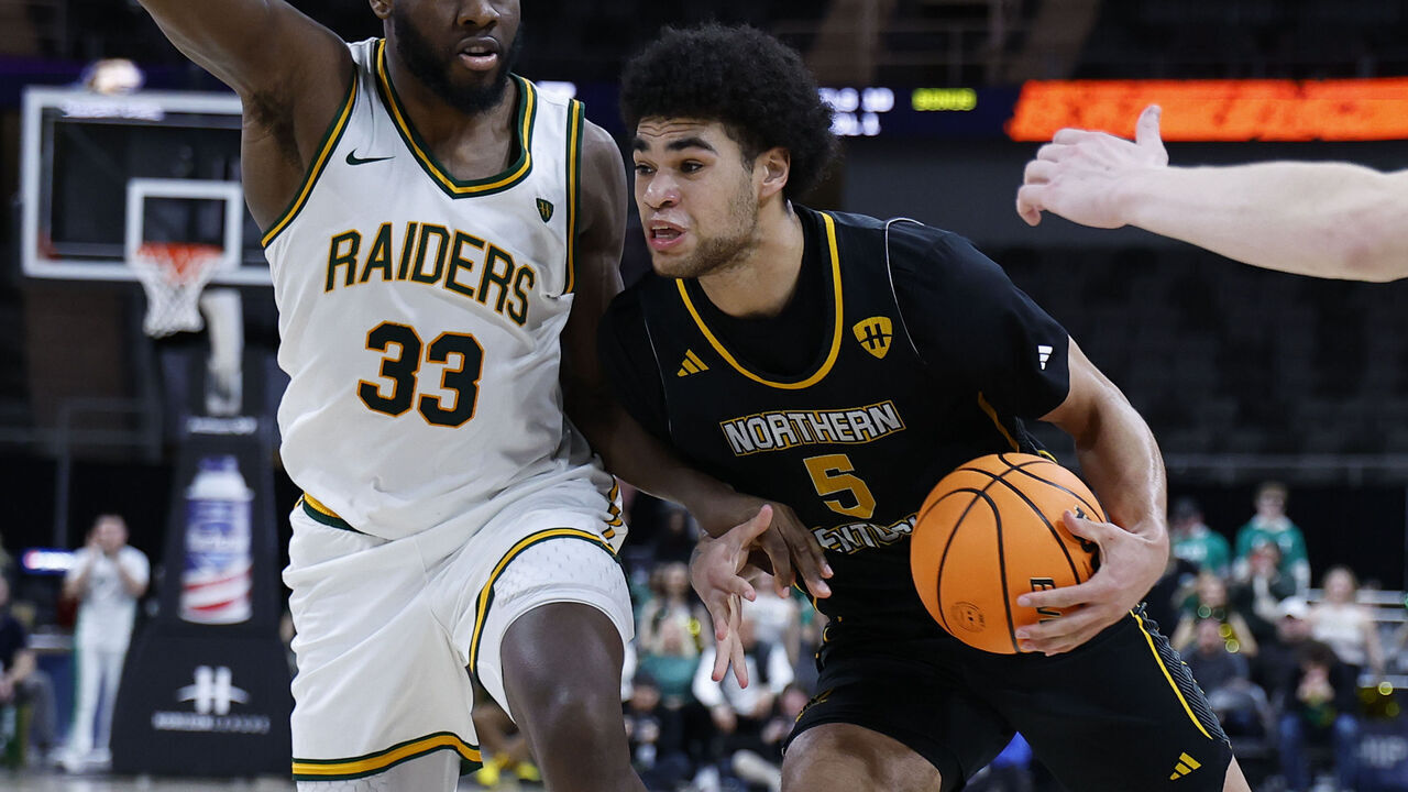 INDIANAPOLIS, IN - MARCH 09: Northern Kentucky Norse forward Lj Wells (5) battles to get past Wright State Raiders forward Michael Imariagbe (33) during the second half during the men's Horizon League Tournament college basketball game between the Wright State Raiders and the Northern Kentucky Norse on March 09, 2026 at Corteva Coliseum in Indianapolis, IN.