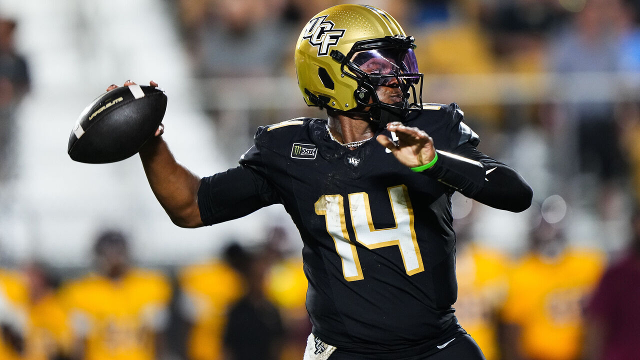 ORLANDO, FLORIDA - September 3: Alonza Barnett III #14 of the UCF Knights passes the ball during the first half against the Bethune Cookman Wildcats at Acrisure Bounce House on September 3, 2026 in Orlando, Florida.