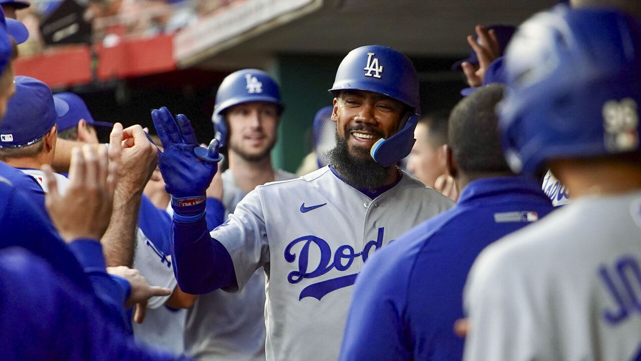 CINCINNATI, OH - SEPTEMBER 14: Teoscar Hernández #37 of the Los Angeles Dodgers high-fives teammates in the dugout after hitting two-run home run in the fourth inning during the game between the Los Angeles Dodgers and the Cincinnati Reds at Great American Ball Park on Monday, September 14, 2026 in Cincinnati, Ohio.