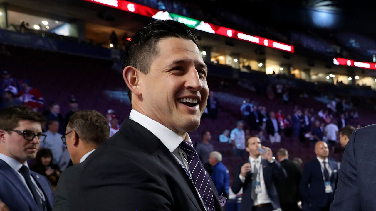 VANCOUVER, BRITISH COLUMBIA - JUNE 21: (L-R) Shawn Horcoff and Ralph Krueger attend the first round of the 2019 NHL Draft at Rogers Arena on June 21, 2019 in Vancouver, Canada.