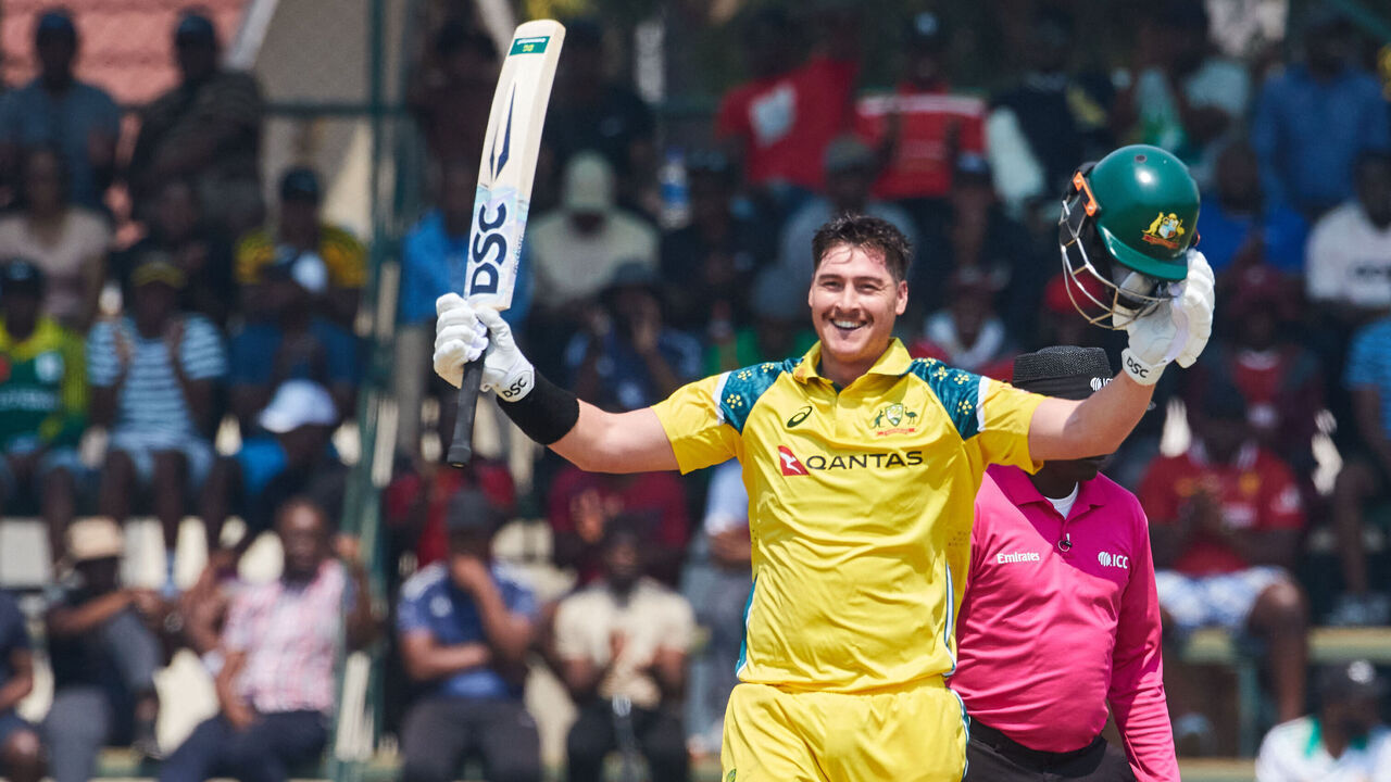 Australia's Matthew Renshaw raises his bat on reaching 100 runs during the first One Day International series played between hosts Zimbabwe and Australia at Harare Sports Club on September 15, 2026 in Harare.