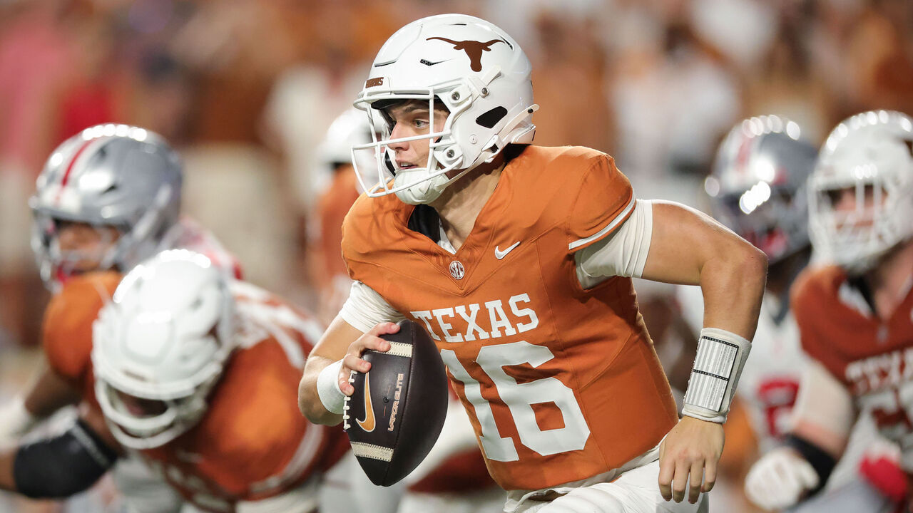 AUSTIN, TEXAS - SEPTEMBER 12: Arch Manning #16 of the Texas Longhorns runs the ball against the Ohio State Buckeyes during the third quarter at Darrell K Royal-Texas Memorial Stadium on September 12, 2026 in Austin, Texas.